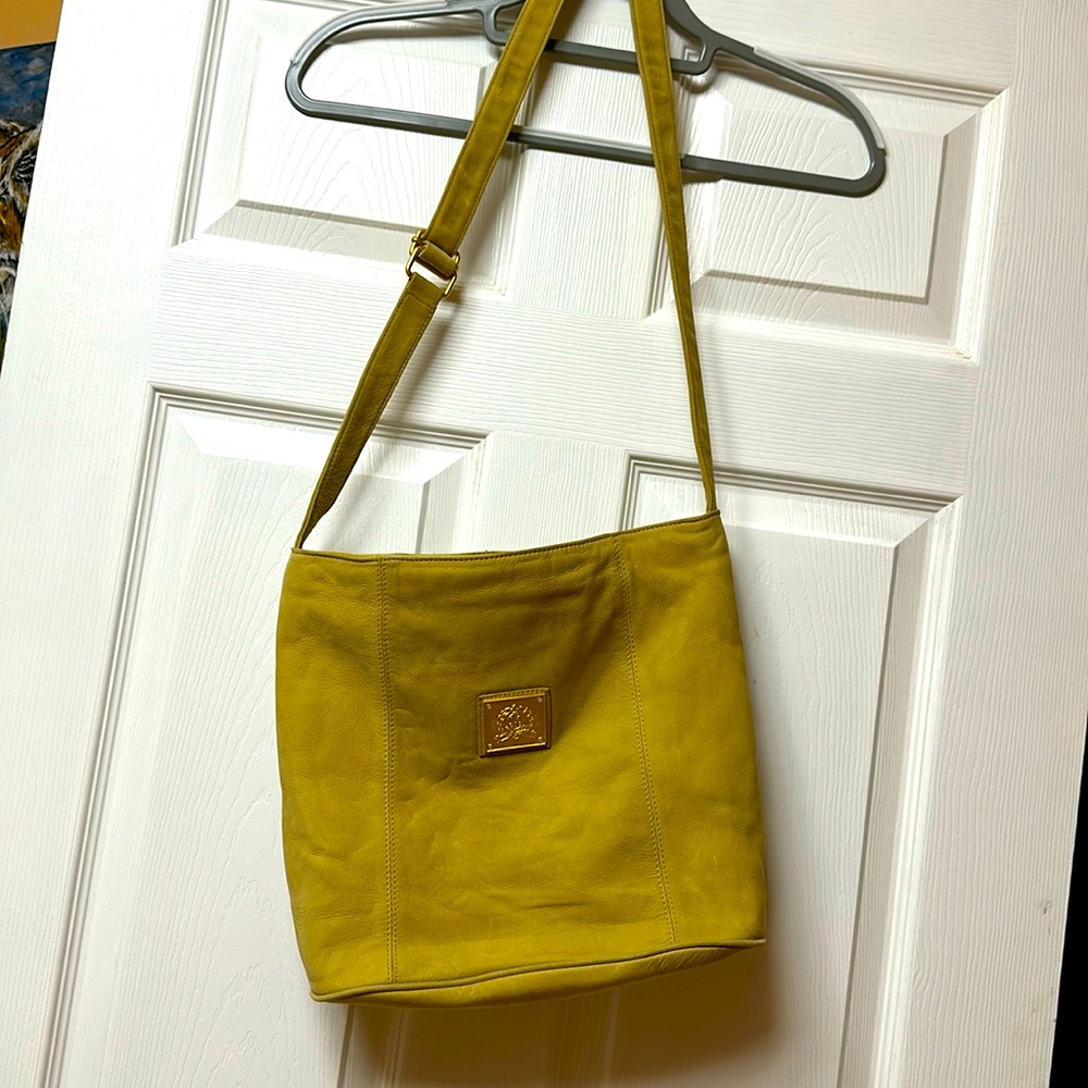 Medallion caw leather tan bag